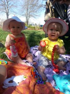 New friends hanging out in the grass after touring the zoo