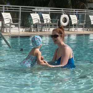 Libby and I in the resort pool in Hollywood, FL in March, blissfully unaware of both the developing fetus and the pending emergency swim diaper situation